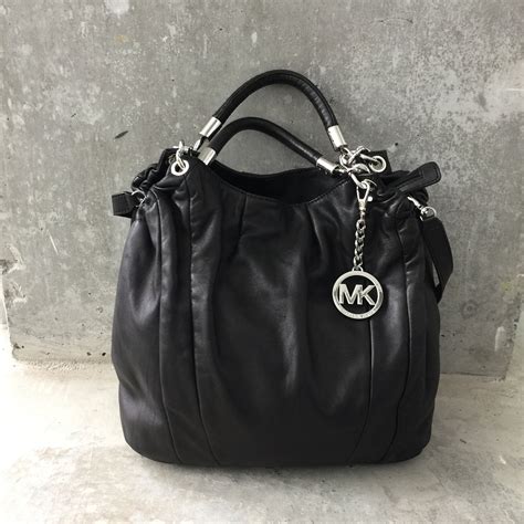 michael kors leather rack|Michael Kors genuine leather handbags.